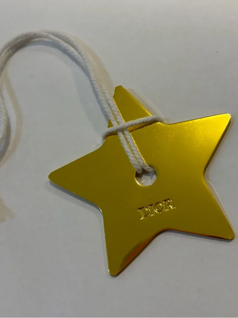 Dior Metallic Gold Star Tag with White Cord